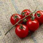 organic, cherry tomates on burlap